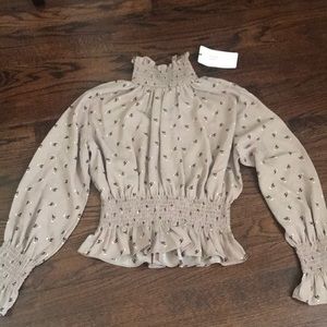 Never worn, tags still on. Size medium. Nice fit